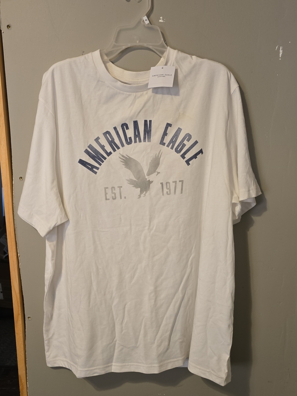 American Eagle Outfitters White T-Shirt with Blue and Gray Logo